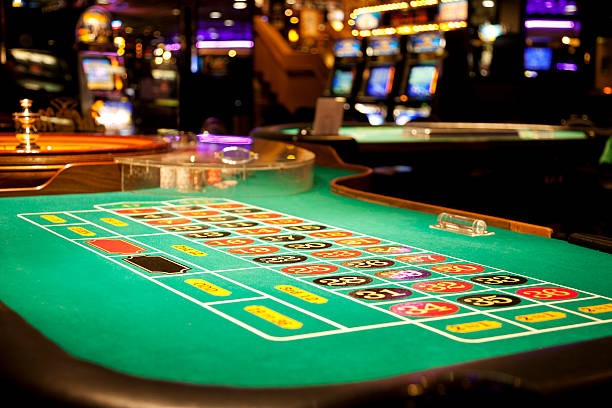 Asia Gaming blackjack and roulette table layout showing cards and betting interface on joker88 motobola